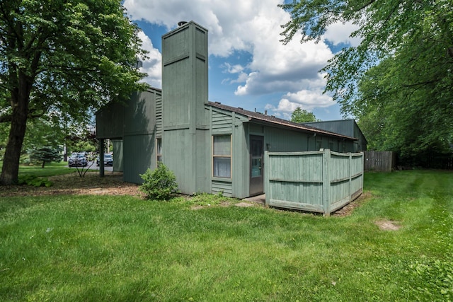 exterior space with a yard