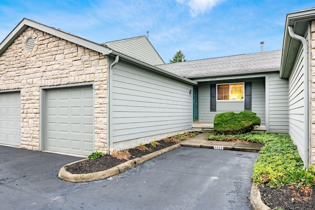 exterior space featuring a garage