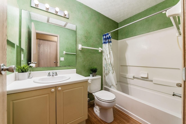 full bathroom featuring shower / bath combo, a textured ceiling, toilet, vanity, and hardwood / wood-style flooring