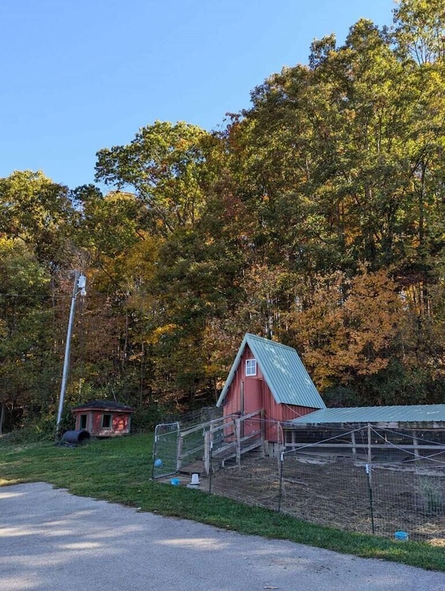 view of jungle gym with an outdoor structure