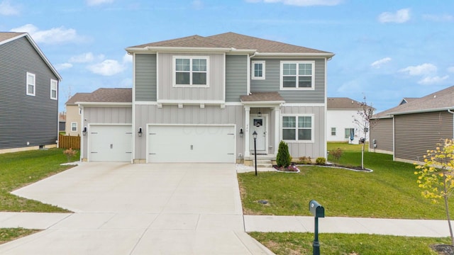 view of property with a garage and a front yard