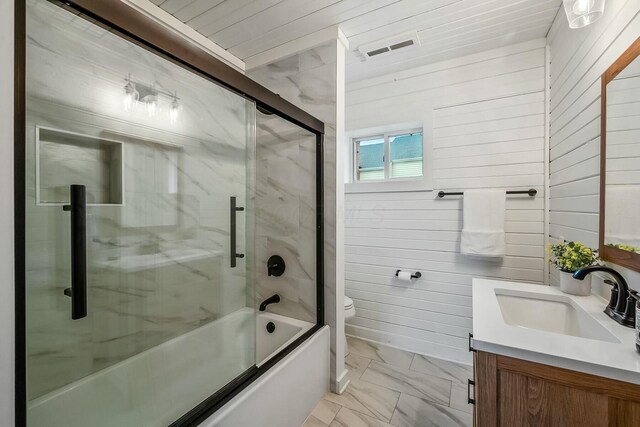 full bathroom with wood walls, combined bath / shower with glass door, toilet, vanity, and wood ceiling