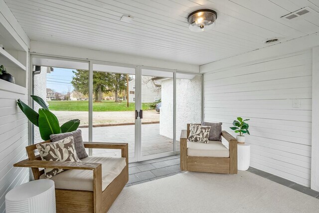 sunroom with wood ceiling