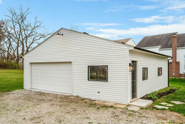 view of property exterior with a garage