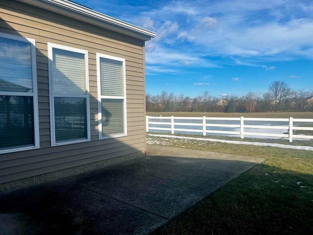 view of property exterior featuring a patio