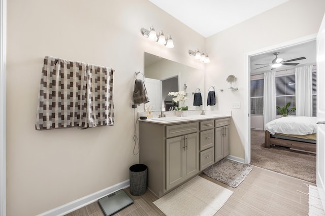 bathroom featuring vanity and ceiling fan