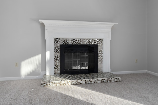 interior details featuring carpet flooring and a fireplace