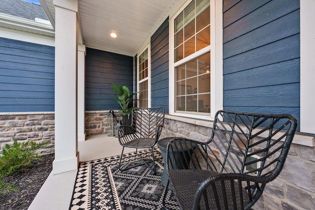 view of patio featuring a porch