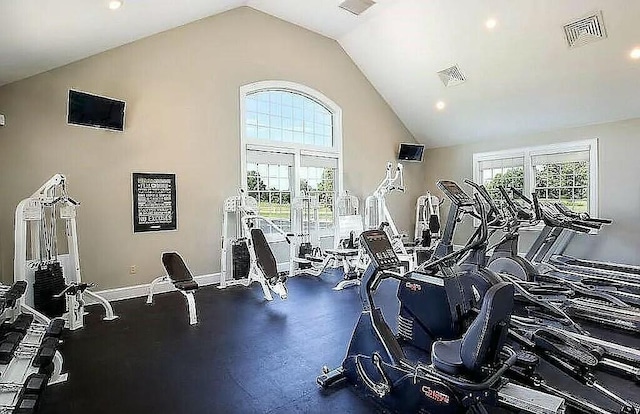 workout area with vaulted ceiling