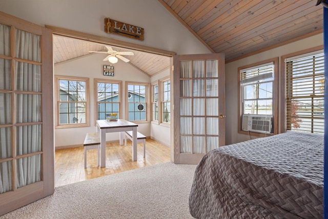 bedroom with ceiling fan, lofted ceiling, wood ceiling, and light hardwood / wood-style flooring