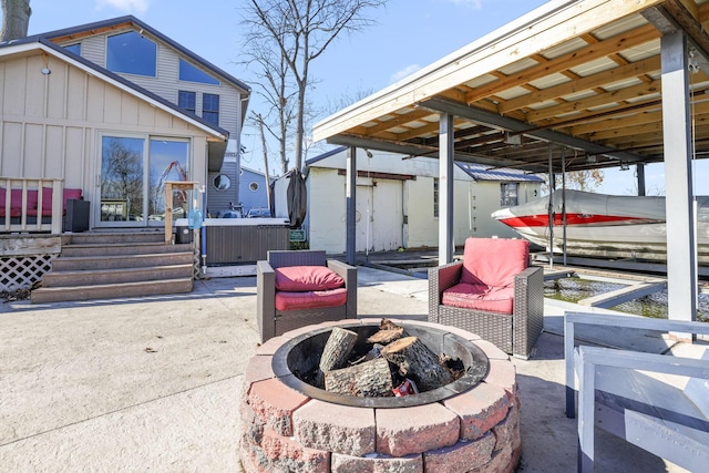 view of patio with an outdoor fire pit