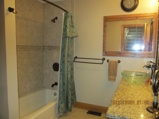 bathroom with vanity, tile patterned flooring, and shower / bathtub combination with curtain