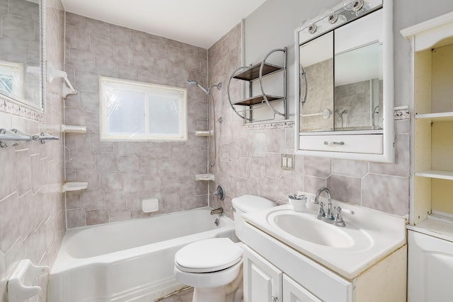 full bathroom featuring vanity, backsplash, tiled shower / bath, toilet, and tile walls