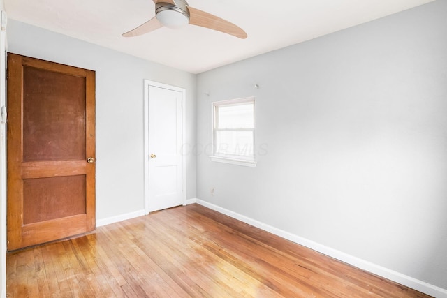 unfurnished bedroom with light wood-type flooring and ceiling fan