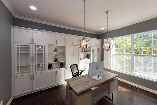 office area with dark hardwood / wood-style floors and crown molding