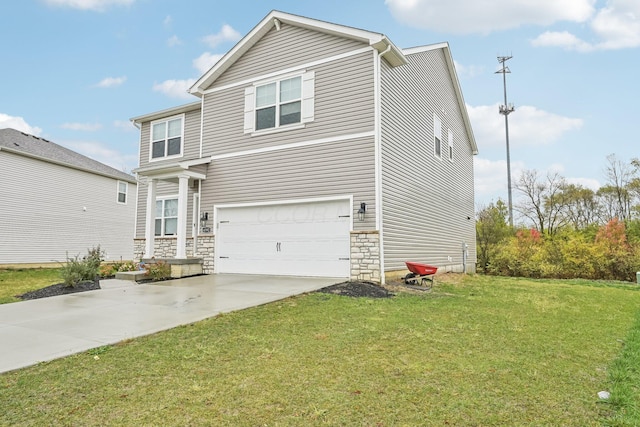 view of front of property with a front lawn and a garage