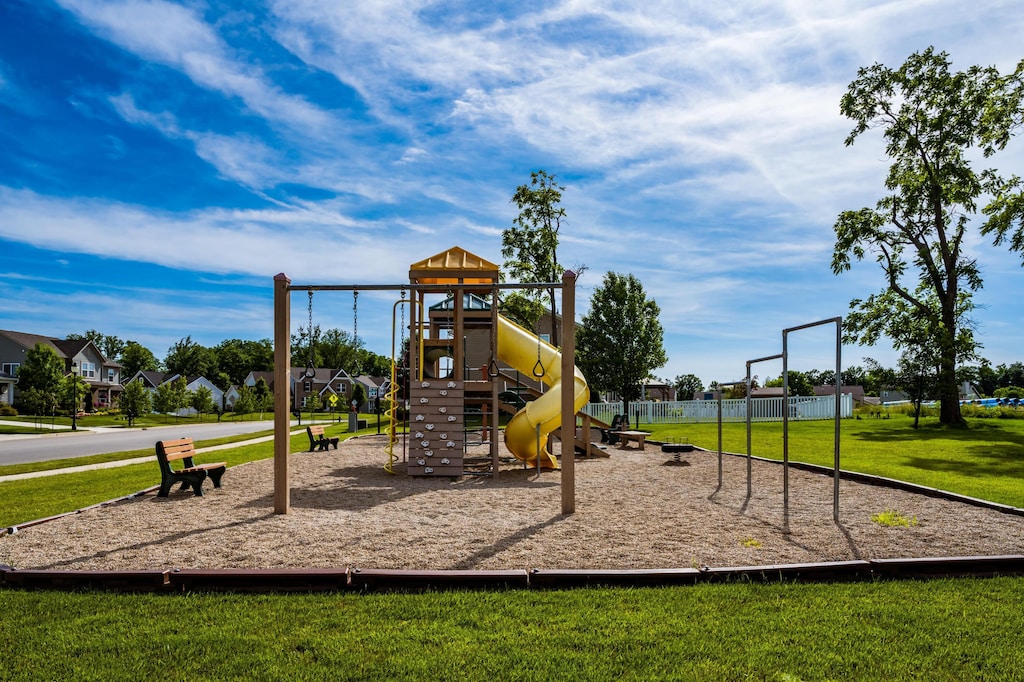 communal playground with a lawn