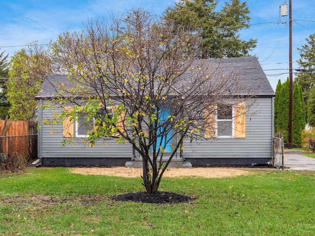 view of home's exterior with a lawn