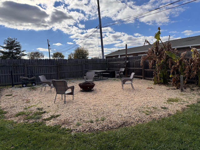 view of yard featuring a fire pit