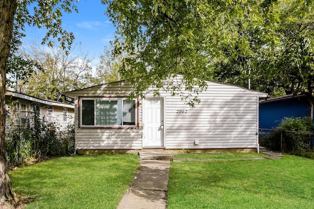 exterior space featuring a front lawn