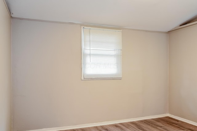 unfurnished room with light wood-type flooring