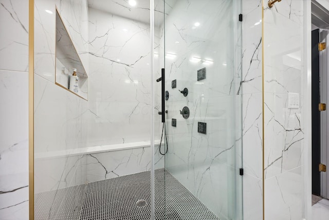 bathroom featuring an enclosed shower