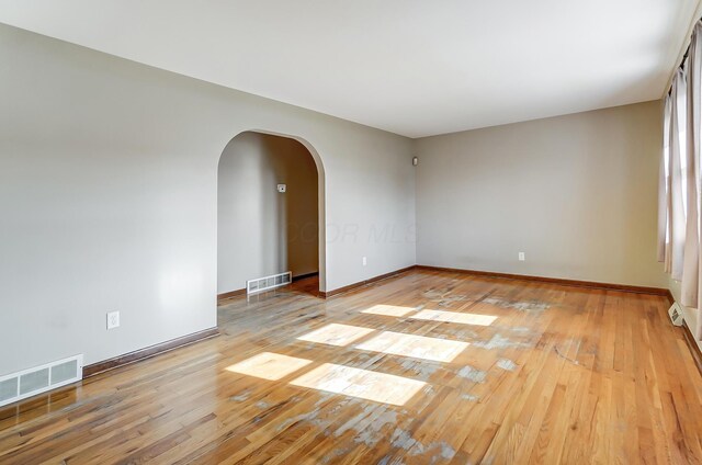 empty room with light wood-type flooring