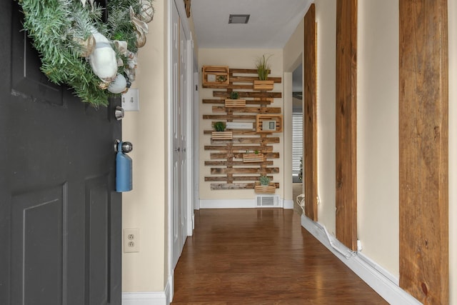 hallway with dark wood-type flooring