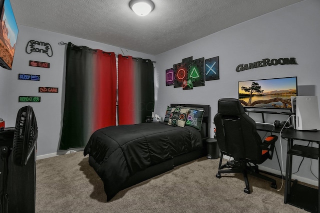 bedroom featuring carpet and a textured ceiling