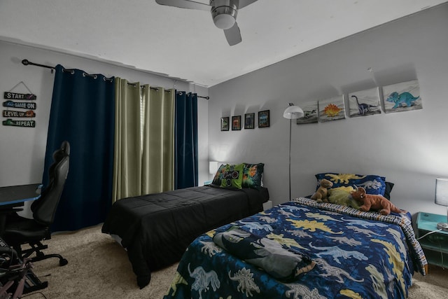 carpeted bedroom featuring ceiling fan