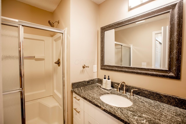 39 Buttles Ave Unit 39, Columbus, OH 43215 - bathroom with a shower stall and vanity