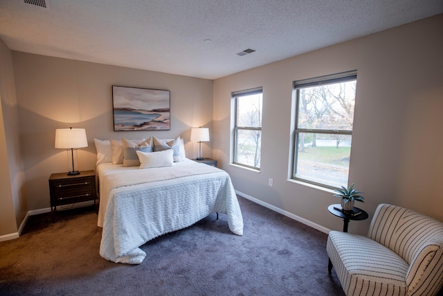 39 Buttles Ave Unit 39, Columbus, OH 43215 - bedroom featuring carpet floors and a textured ceiling