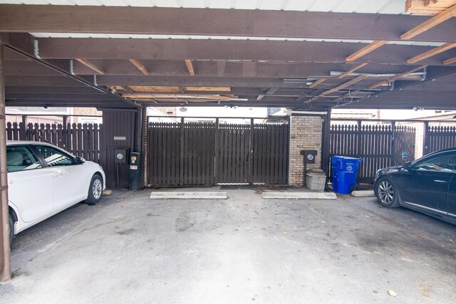 garage featuring a carport