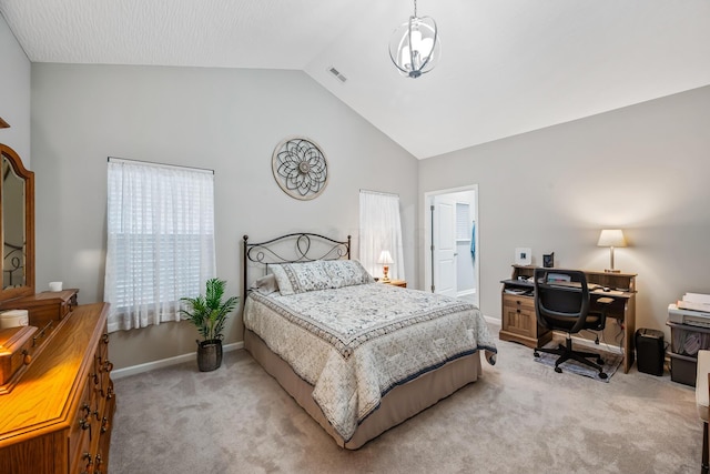 bedroom featuring light colored carpet and high vaulted ceiling