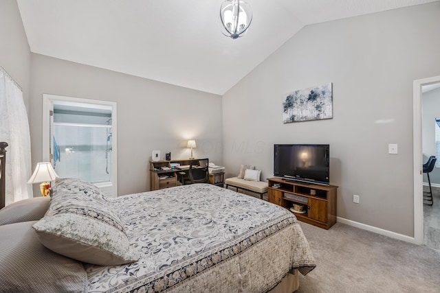 carpeted bedroom featuring lofted ceiling