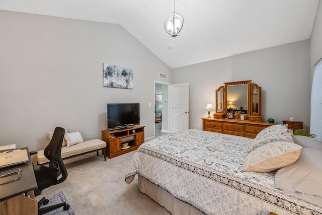 bedroom with carpet and lofted ceiling