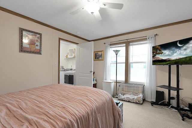 bedroom featuring washer and clothes dryer, crown molding, ceiling fan, a textured ceiling, and light colored carpet