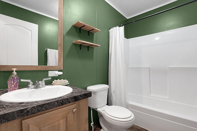 full bathroom featuring vanity, crown molding, toilet, shower / bath combo with shower curtain, and a textured ceiling