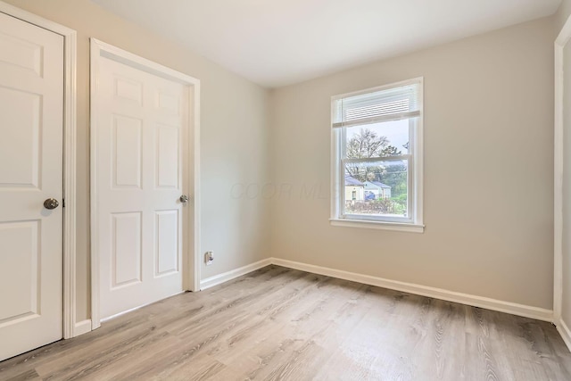 empty room featuring light hardwood / wood-style flooring