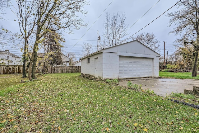 garage with a lawn