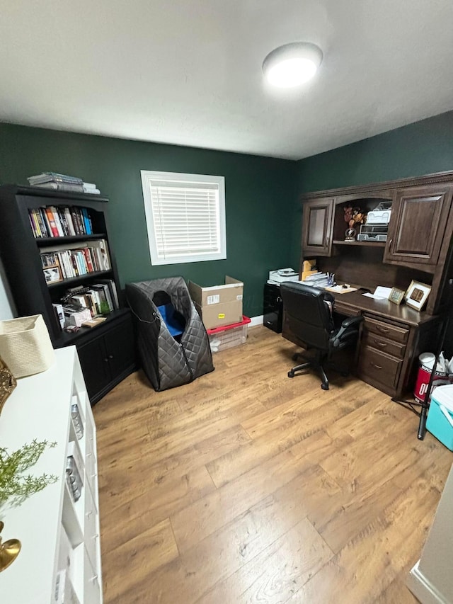 home office with light wood-type flooring