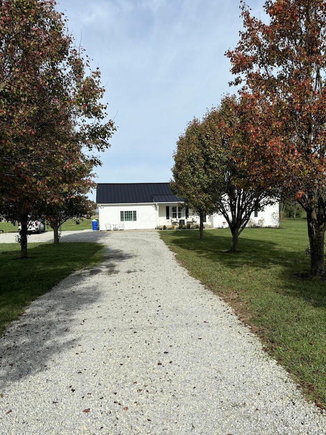 view of front of home with a front yard