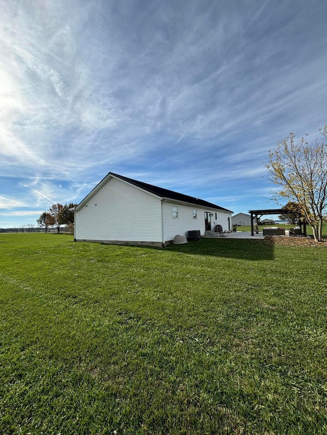 view of home's exterior featuring a lawn