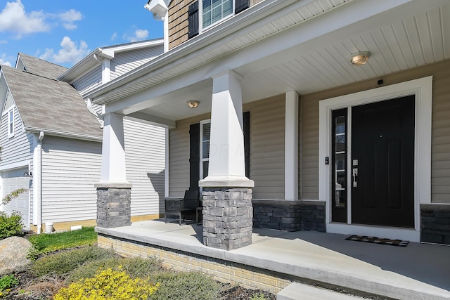 doorway to property with covered porch