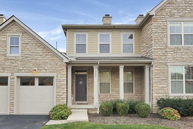 view of front of home with a garage