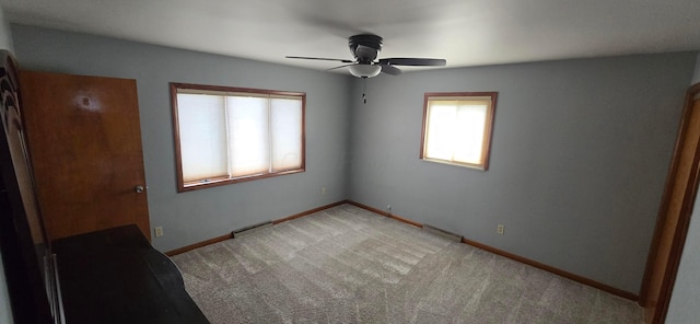 unfurnished bedroom with carpet and ceiling fan