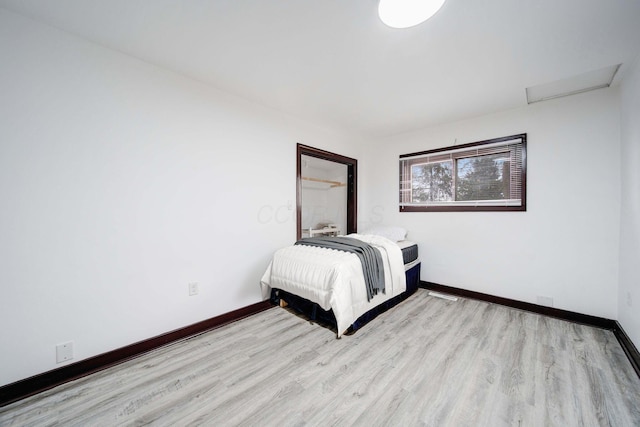 unfurnished bedroom featuring light hardwood / wood-style floors