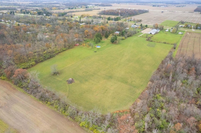 birds eye view of property featuring a rural view