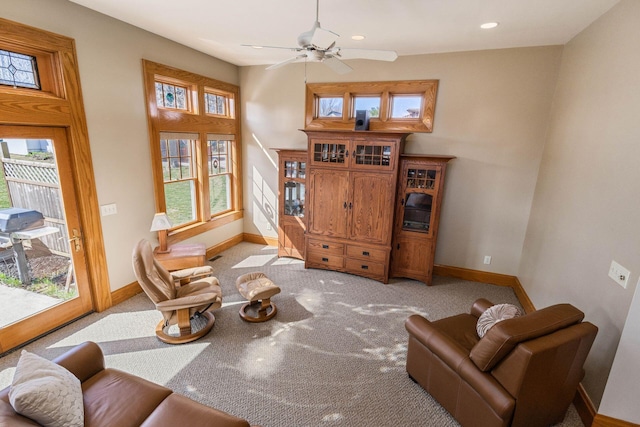 carpeted living area with recessed lighting, baseboards, and ceiling fan