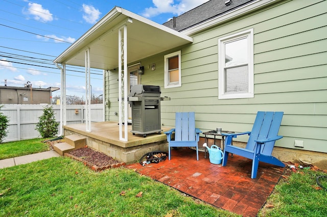 view of patio with a grill